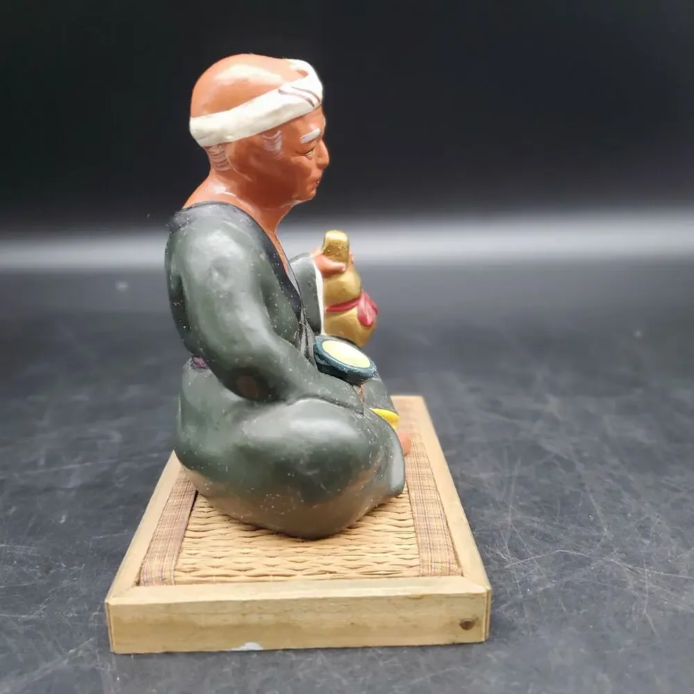 Vintage Asian Seated Man Figurine Holding Gourd Cup Woven Wood Base